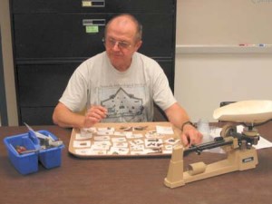 PAS member sorting artifacts at the archaeology laboratory at the University of West Florida.